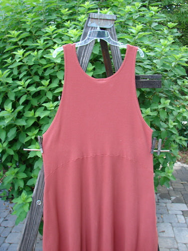 Barclay Thermal Teapot Jumper Unpainted Pomme Size 1 displayed on a wooden rack, featuring cozy ribbed thermal waffle fabric, deep arm openings, a downward scooped waistline, and deep side pockets.