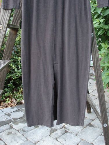 A close-up of a pair of 1992 Cotton Lycra Back Vent Dress pants in black.