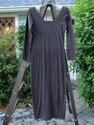 A 1992 Cotton Lycra Back Vent Dress in Black Sand. Hourglass shape, rear kick vent, V front and rear neckline, pegged hemline. Size 2.