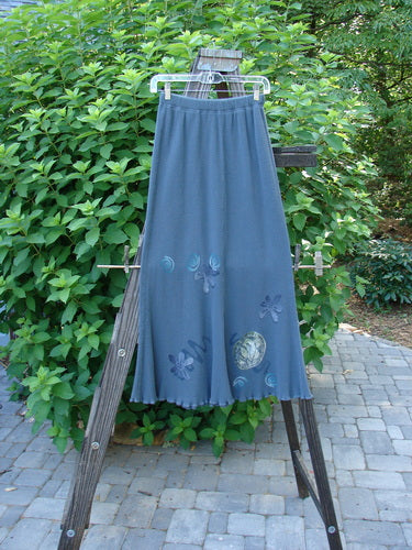 1996 Thermal Swirl Skirt Flower Mirror Size 0: A long blue skirt with a serious A-line flair, lettuce edging, and abstract theme paint.