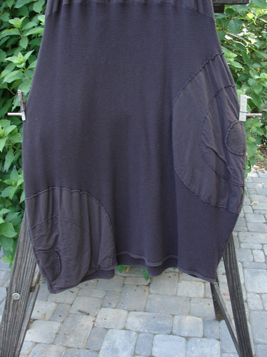 Barclay Thermal Celtic Moss Panel Pocket Circle Skirt Unpainted Darker Bark Size 2 displayed on a rack, showcasing its full elastic waistline, deep front entry pockets, and alternating circle patches.