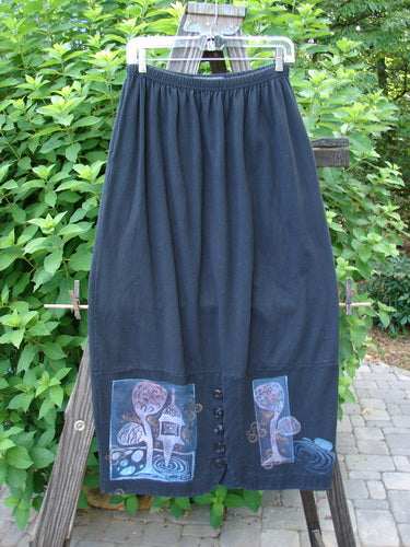 1997 Indra Skirt Whimsical Forest Obsidian Size 1 features a full elastic waist, double-paneled lower, colorful buttons, deep side pockets, and whimsical forest-themed accents.