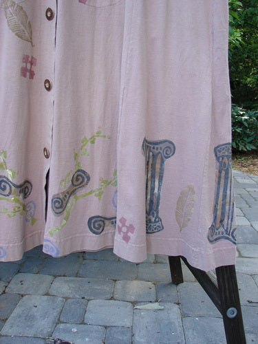 1993 Modernismo Duster Dress Columns Ash Pink OSFA with blue column and leaf patterns, wooden topped buttons, kangaroo front pockets, scooped neckline, and a drawcord back.