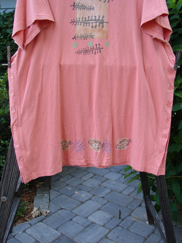 1997 Mauritius Top Fern Fish Tangerine OSFA displayed on a clothes rack, featuring clear and textured floral buttons, tall side vents, and a signature patch with a classic fern fish design.