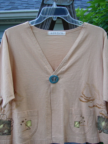 1997 Cove Jacket Sea Life Driftwood Size 1, featuring a flared A-line shape, single porcelain closure, V neckline, and bright blue fish patch.