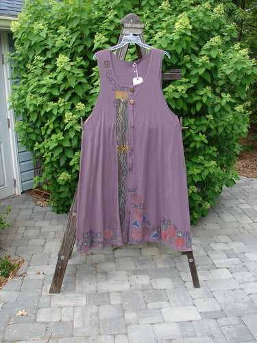 1993 NWT Long Column Vest Metallic Column Dusty Plum OSFA displayed on a rack, showcasing deeper arm openings, widening lower sweep, deep oval neckline, vertical metallic paint, and vintage wooden-like buttons.
