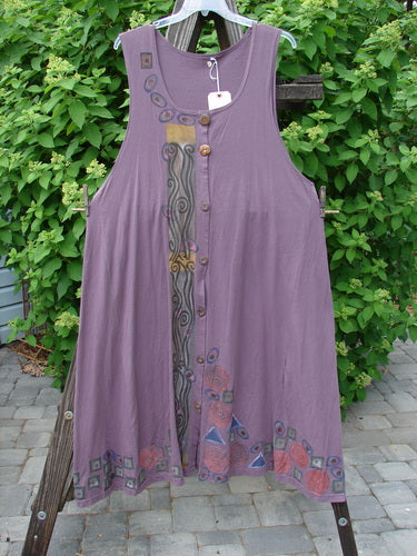 1993 NWT Long Column Vest Metallic Column Dusty Plum OSFA displayed on a rack, featuring deep arm openings, a widening lower sweep, and vintage wooden buttons.