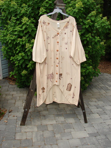 1994 Convertible Coat Spring Garden Tea Dye OSFA displayed on a rack, showcasing its unique button-on/off sleeves, upward scooped front hemline, and spring garden theme paint, epitomizing vintage Blue Fish Clothing's creative versatility.