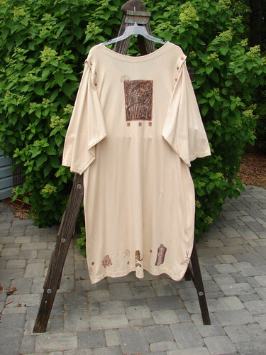 1994 Convertible Coat Spring Garden Tea Dye OSFA displayed hanging on a rack, showcasing its button-on/off sleeves, upward scooped front hemline, and textured, painted spring garden design.