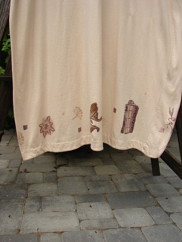 1994 Convertible Coat Spring Garden Tea Dye OSFA, featuring button-on/off sleeves for versatile wear, outward scooped hemline, and unique garden-themed paint, displayed on a white towel with brown designs.