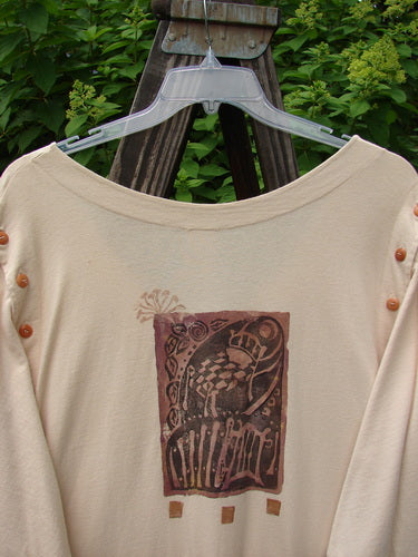 1994 Convertible Coat Spring Garden Tea Dye OSFA displayed on a hanger, showcasing its unique button-on/off sleeves and upward scooped front hemline, highlighting its versatile design and spring garden theme.