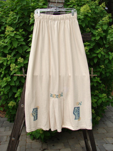 1995 Kick Skirt Resort Travel Champagne Size 2 featuring a blue design, full thick elastic waist, rear kick pleat, and painted accents on the waistband. Organic cotton, vintage Blue Fish Clothing.