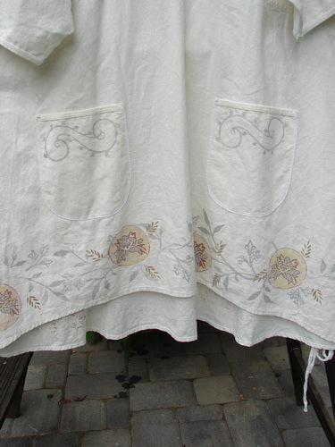 Barclay Linen Duet Sunrise Dress Fern Circle Flower Creme Size 2 featuring curly cotton neckline, vertical pleats, two front pockets, and floral fern design on woven linen fabric.