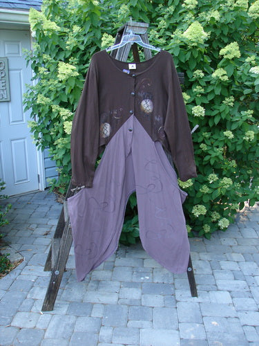 Barclay NWT Calligrapher's Jacket Worldly Lilac Mocha Size 2 displayed on a rack, featuring dramatic long dippy sides and a specialized four-button front with a deep V-shaped neckline.
