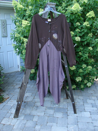 Barclay NWT Calligrapher's Jacket Worldly Lilac Mocha Size 2 displayed on a wooden rack, showcasing its dramatic shape, long dippy sides, and unique four-button front.