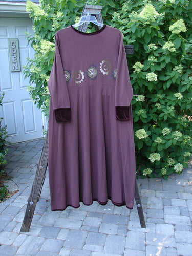 1996 Velvet Ornamental Pocket Dress Spirograph Spicewood Size 1 displayed on a swing, highlighting its sweeping A-line shape, velvet accents, and intricate spirograph design.