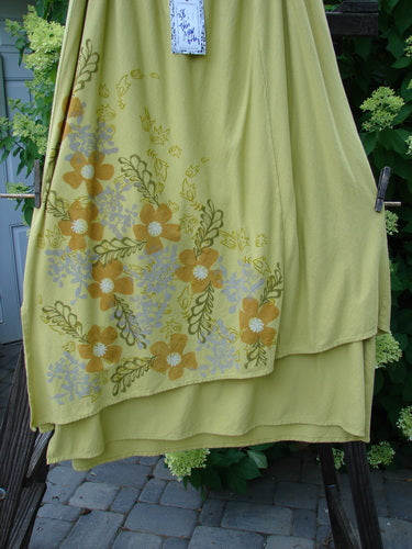 Barclay NWT Double Layer Prospect Park Skirt Floral Citron Size 2, featuring a full elastic waistline, generous diagonal floral pattern, and sectional panels, showcasing a spring collection's organic cotton design.