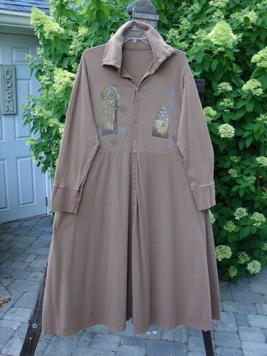 1995 Virginia Woolf Dress Home Tree Cottage Brown Size 2, featuring a long brown coat-style dress with ribbed accents, front snaps, deep side pockets, and a sweeping hemline, hanging on a tree.