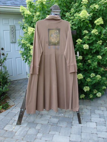 1995 Virginia Woolf Dress Home Tree Cottage Brown Size 2 displayed on a wooden stand, featuring ribbed accents, tiny front snaps, sweeping hemline, and deep inseam side pockets.