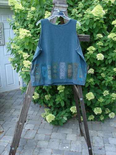 Barclay Cotton Lycra Summer Tank Continuous Puddle Size 1 displayed on a wooden ladder, showcasing its round neckline and slightly tapered lower shape, ideal for a vintage Blue Fish Clothing collection.