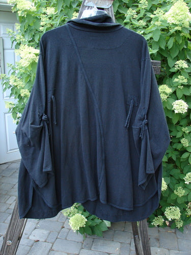 Barclay NWT Hemp Cotton Tidal Jacket Roses Black Size 2 displayed on a hanger, featuring oversized button closure, exterior pockets, and unique S curved seam with climbing rose theme detailing.