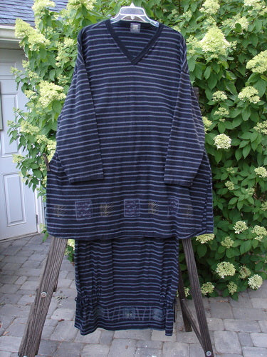 1999 Stripe Box Straight Tie Duo Water Fern Black Size 2: a striped top with ribbed V-neck, vented sides, and matching skirt with elastic waist, bottom side ties, and pegged cut, on a rack.