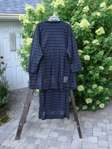 1999 Stripe Box Straight Tie Duo Water Fern Black Size 2: A striped shirt and matching skirt on a swinger, with a close-up of the dress on a stand.