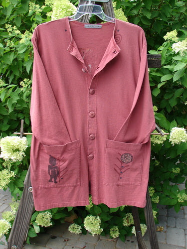 1996 Elements Everyday Jacket Primitive World Ember Size 1, featuring scribe buttons, two oversized exterior pockets, and a longer, slightly narrowing shape, made from mid-weight organic cotton.