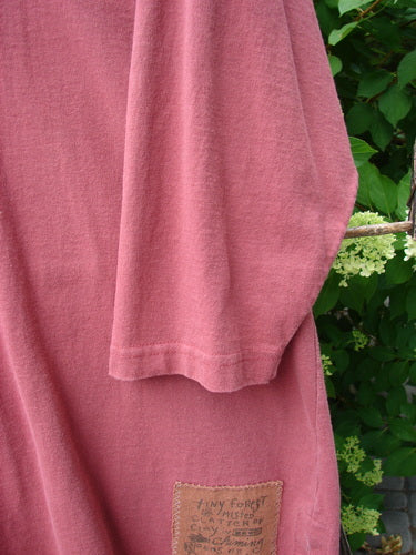 Close-up of the 1996 Elements Everyday Jacket Primitive World Ember Size 1, showcasing scribe buttons, two oversized painted drop pockets, and signature Blue Fish patch with primitive world theme paint.