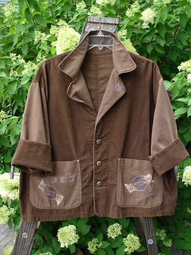 1997 Corduroy Mason's Jacket Structural Lumber OSFA featuring a unique folded neckline, two front painted pockets, cuffed cord sleeves, and intricate metal buttons, embodying BlueFishFinder's vintage aesthetic.