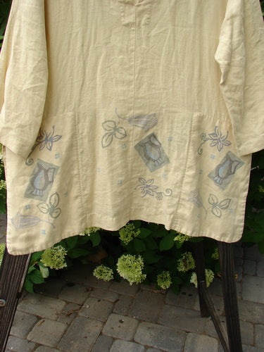 1999 Linen Antique Top Garden Plantain Size 1, featuring vented sides, hidden pockets, V neckline, rounded drop collar, and garden-themed paint.