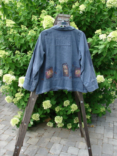 Barclay Patched Open House Canvas Barn Jacket Power Village Blue Jean Stripe Size 1 displayed on a wooden stand, highlighting its heavy canvas hemp material, sectional panels, and distinct patched accents.