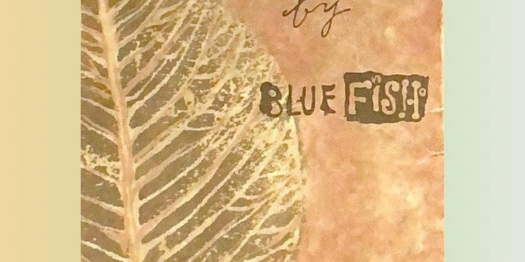 A close-up of a leaf with text and handwriting on paper in pastel pallet of natural greens and oranges Rediscover vintage Blue Fish clothing at Bluefishfinder.com.