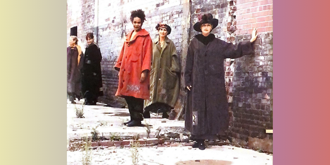 Four Models standing against a wall displaying red green and black blue fish winter coats