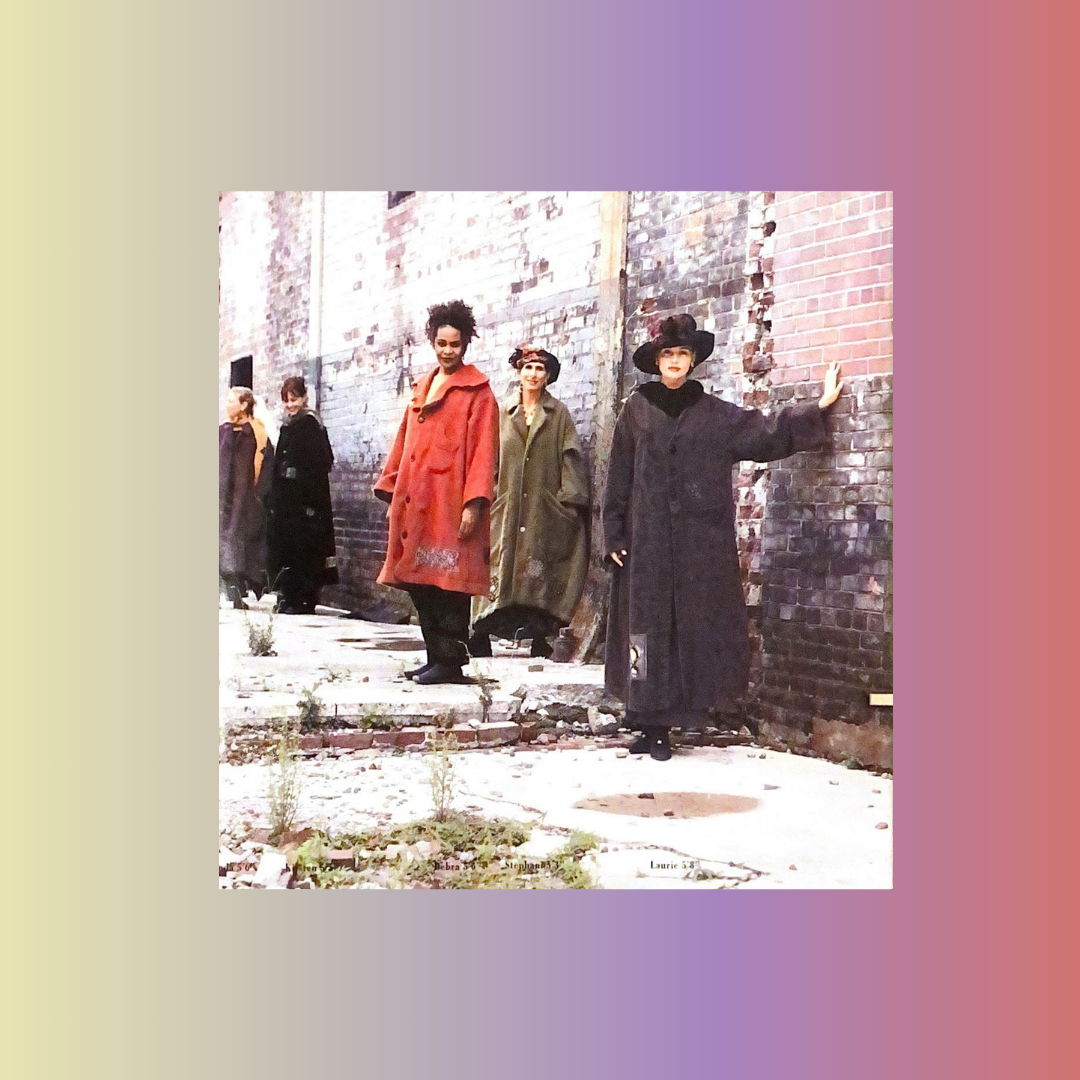 Four Models standing against a wall displaying red green and black blue fish winter coats