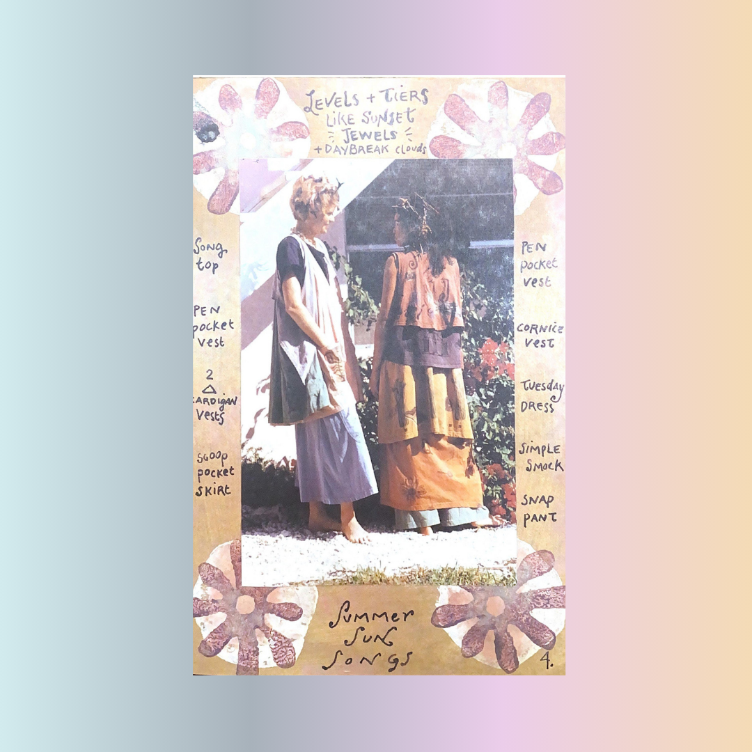 Two modles one facing forward and one facing back displaying colorful layers of blue fish clothing