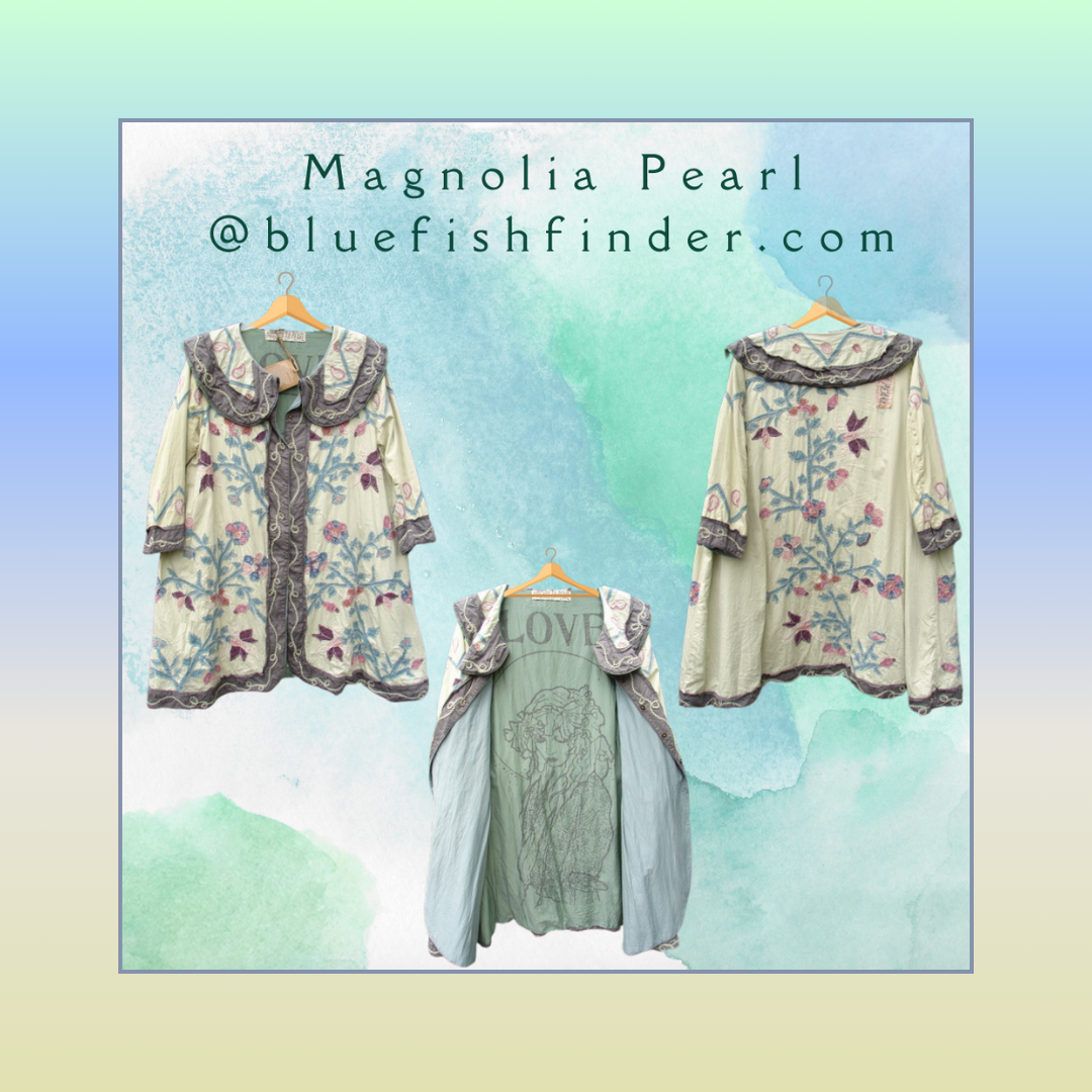 A Creative of one Magnolia Pearl Piece called the Joules Jacket. Three different images display the front, back and inside of the piece on wooden hangers. The colors are pastel clouds in green blue while and yellow, as if floating through the sky.