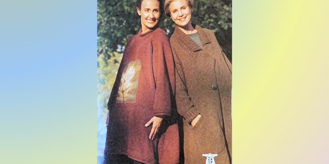 Two Ladies shoulder to shoulder each modeling a sweater in Rusts and Light Browns. The gals are smiling one has her hands in the pockets the other hands by her side. Trees are in the background and tiny line drawings are at the bottom right.