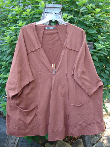 Barclay Photogram Open Front Santa Fe Jacket Garden Scrape Desert Clay OSFA displayed on a hanger, showcasing its wide three-quarter sleeves, open front, angular hem, and unique painted rear design.
