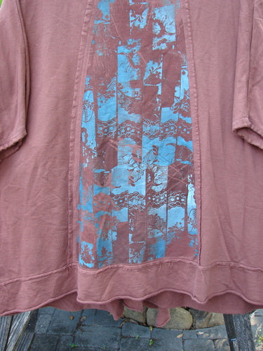Barclay Photogram Open Front Santa Fe Jacket Garden Scrape Desert Clay OSFA features wide three-quarter sleeves, an angular hem, and raw edges, showcased in a close-up of its intricate textile pattern.