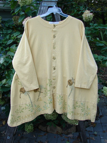 1998 Botanicals Orchard Jacket Vine Pod Sundial Size 2, featuring a vine and pod design, button-down style, wide banded A-line hem, drop shoulders, and signature Blue Fish patch on the back shoulder.