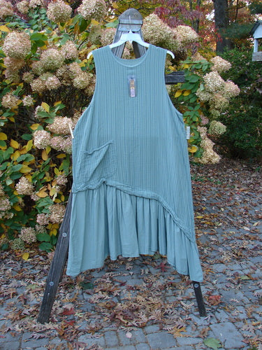 Barclay NWT Varano Jumper dress on rack with wood pole detail.