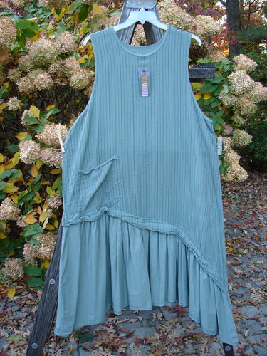 Barclay NWT Gauze Varano Jumper: Blue dress on rack with subtle stripe tone bodice, diagonal texture, offset pocket, deep arm openings, ruffled hem, and diagonal fold. Size 2.