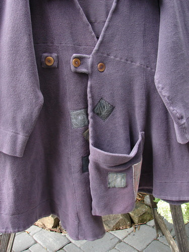 2000 PMU Celtic Moss Highlander Coat Aubergine Size 1, featuring oversized buttons, empire waistline, diagonal back seams, big collar, and multiple patches, showcasing Bluefishfinder.com's unique vintage style.