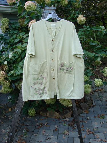 2000 Double Decker Pocket Top Flower Fall Peapod Size 2 on a rack, featuring oversized pockets, pleated backline, and signature Blue Fish Patch design, showcasing its unique structure and movement.