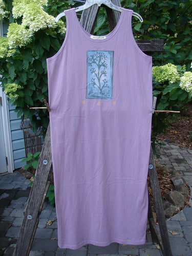 1997 River Journey Dress Sea Coral Jasmine Altered Size 1, displayed hanging on a clothesline, showcasing its scoop neckline and slimmer fit with a distinctive sea coral theme.