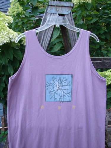 1997 River Journey Dress Sea Coral Jasmine Altered Size 1, featuring a purple tank top style with a blue square and a scoop neckline, captured on a wooden rack.