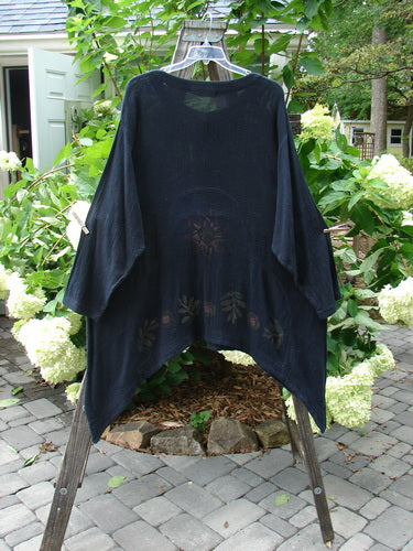 1998 Limited Edition Gauze Orchard Jacket Nature Raven Size 2 displayed on a rack, showcasing its wide-banded A-line shape, rounded button front, and unique nature-themed paint details.