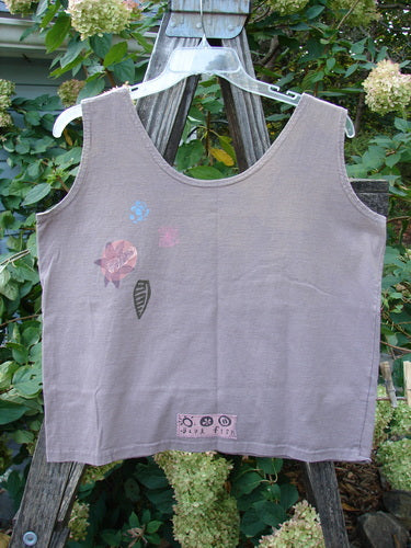 1992 Oversized Tank Double Fish Cloud Altered OSFA features a distinctive flower design, showcasing a wide, boxy shape with altered shoulder, slightly shallow arm openings, and a unique blue fish patch.