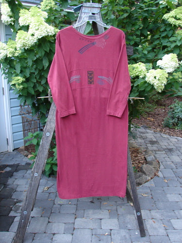 1995 Empire Dress Abstract Continuum Hollyberry Altered Size 1 displayed on a wooden rack, showcasing its elegant slimming shape and unique painted neckline.